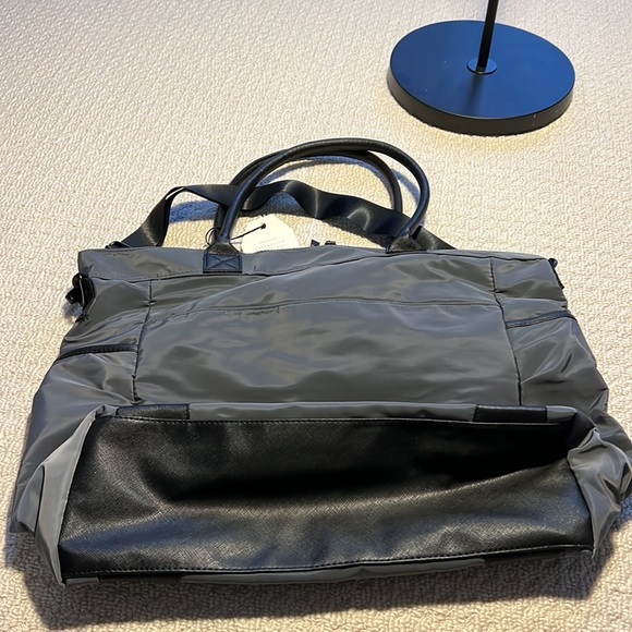 Indigo diaper bag, brand new, has cross body strap and over the shoulder straps - Picture 2 of 7